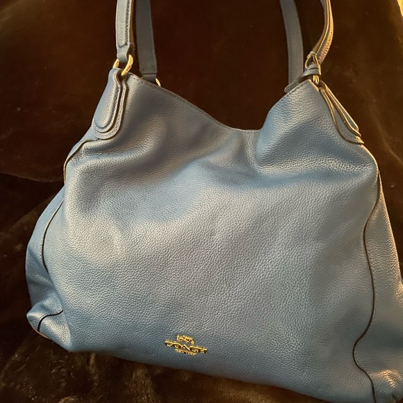 The Coach Edie bag soft slouchy silhouette style with functional design. - Picture 1 of 13